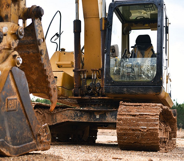 Bulldozer Moving Earth On A Worksite